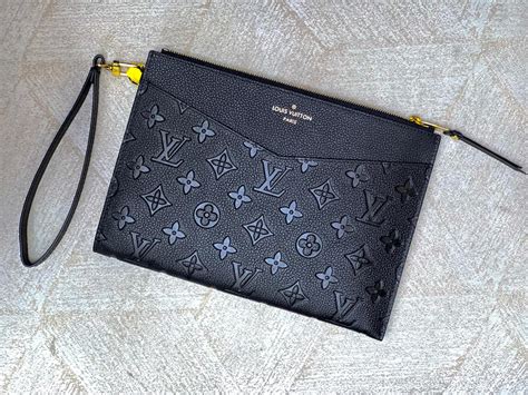 louis vuitton bag with two front pockets|louis vuitton daily pouch wristlet.